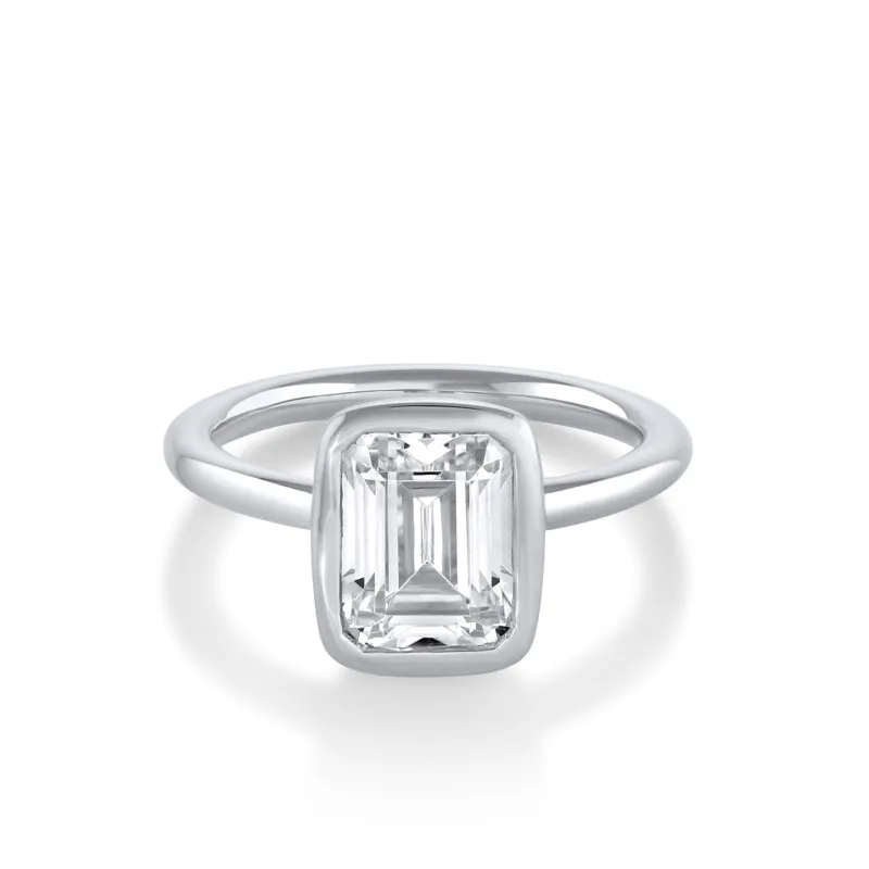 The Roxy Bezeled Emerald Cut Engagement Ring sold by Marrow Fine