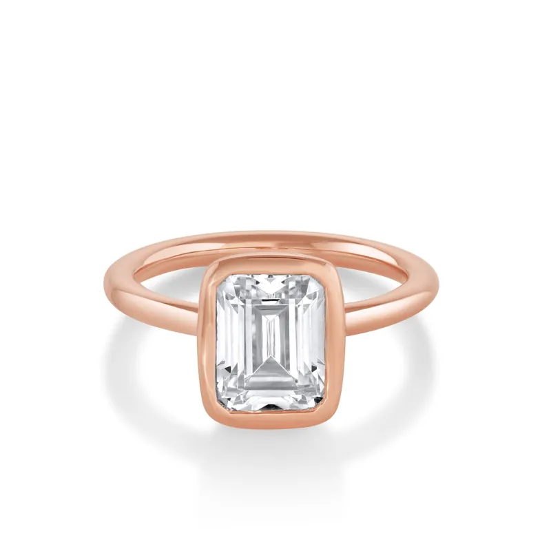 The Roxy Bezeled Emerald Cut Engagement Ring sold by Marrow Fine