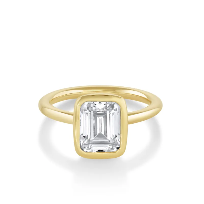 The Roxy Bezeled Emerald Cut Engagement Ring sold by Marrow Fine