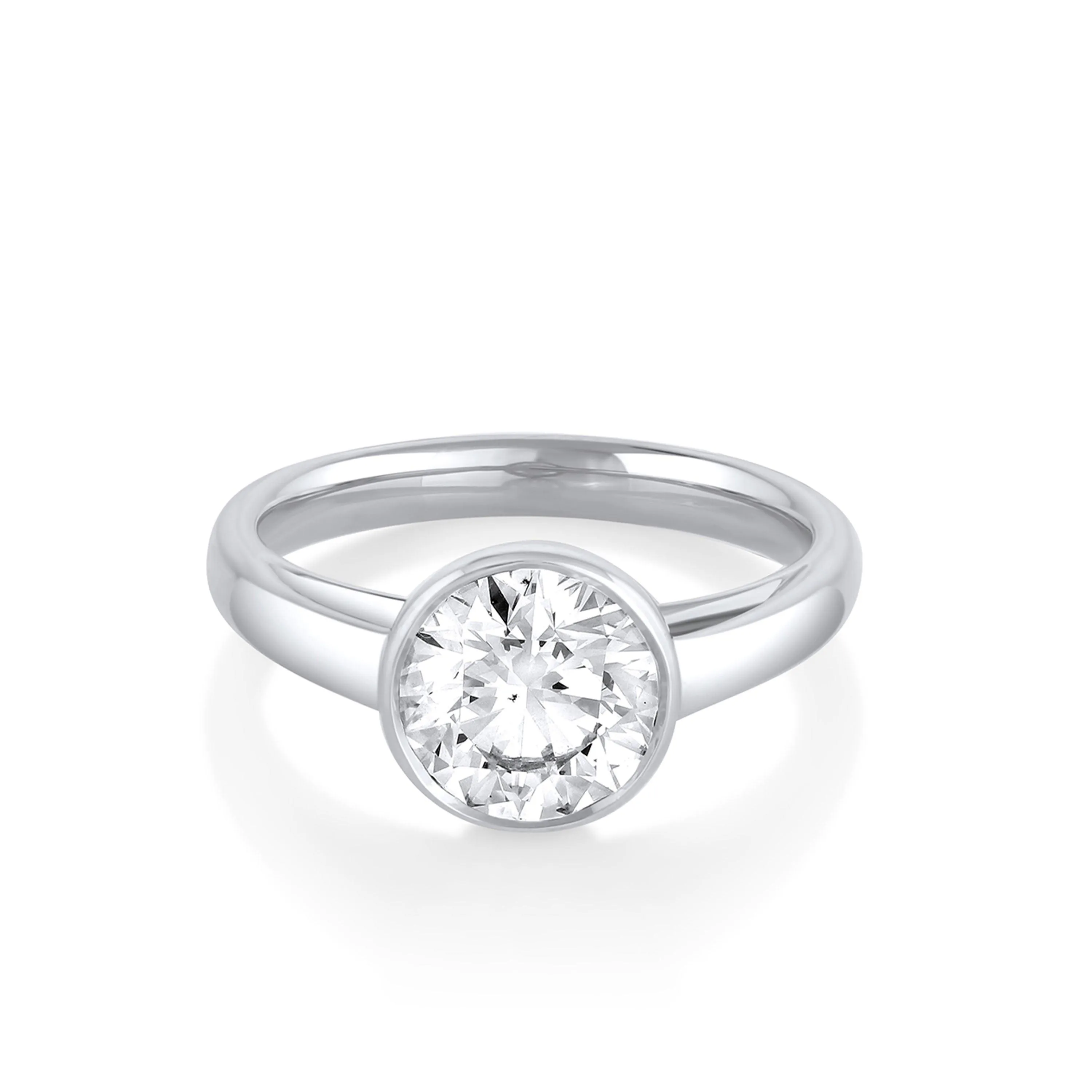 The Tessa Bezel Round Solitaire Engagement Ring sold by Marrow Fine