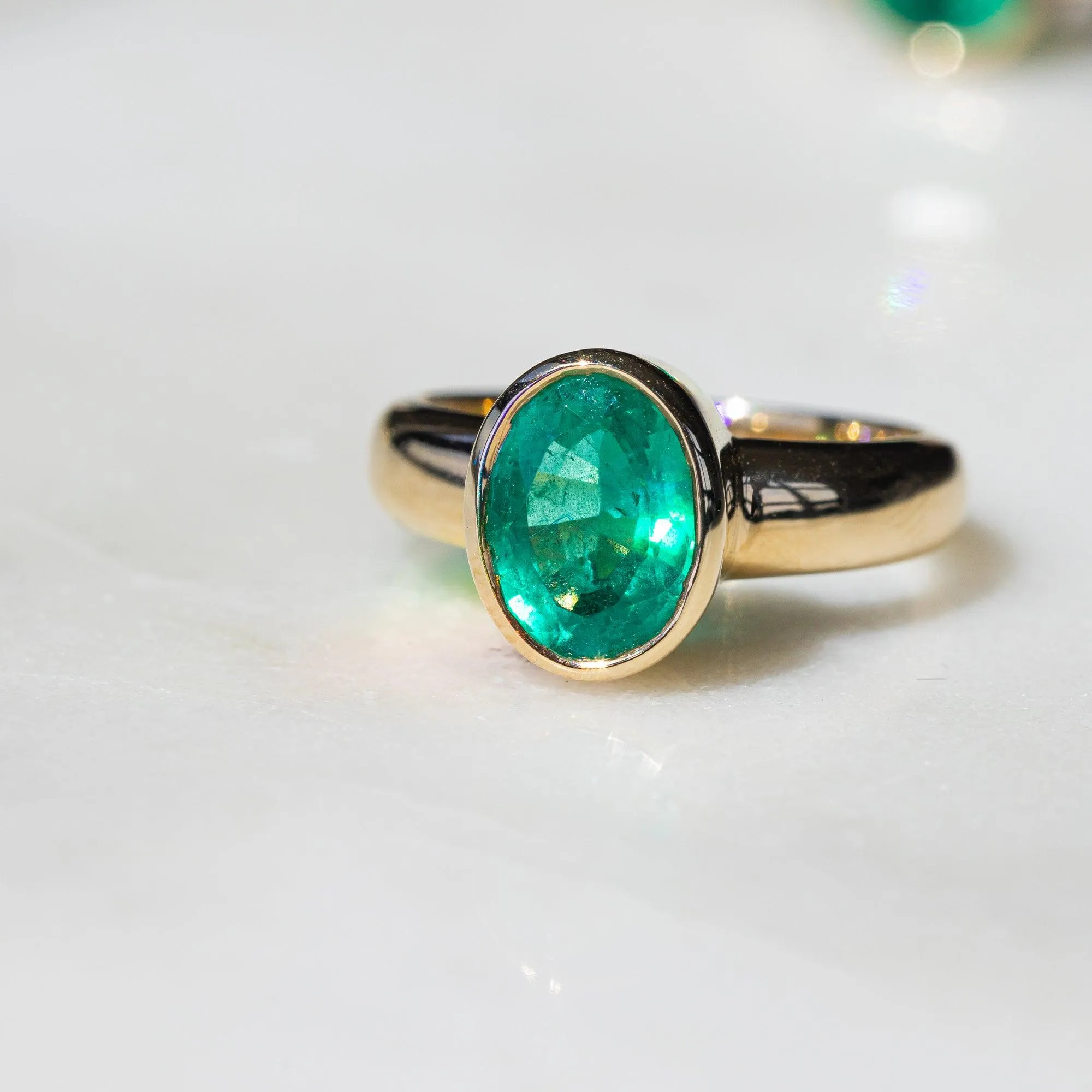 2.58ct Emerald Oval Bezel Ring sold by Marrow Fine product image thumbnail 3