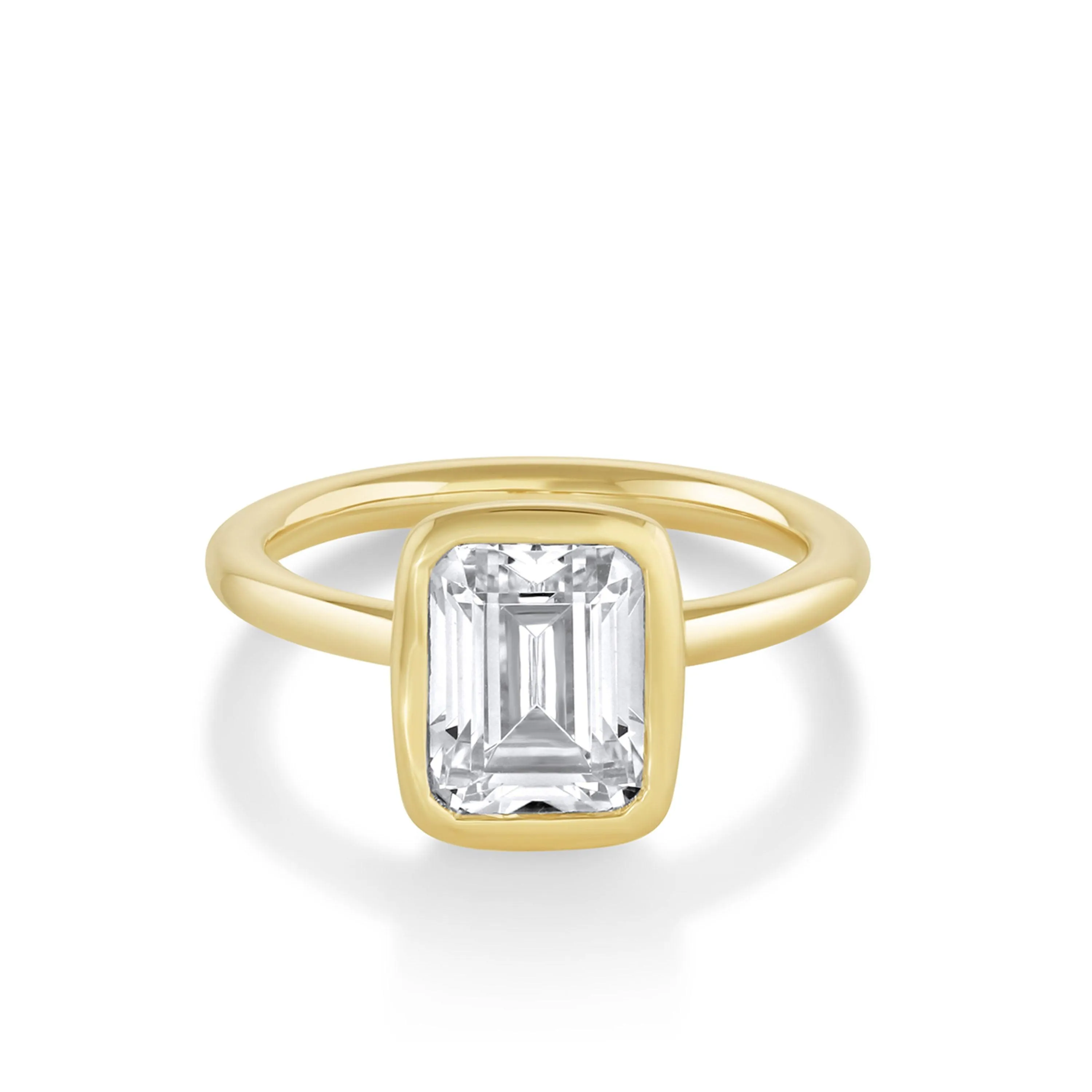 The Roxy Bezeled Emerald Cut Engagement Ring sold by Marrow Fine