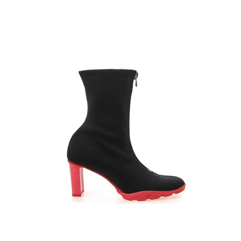 Sleek Neoprene and Leather Black Boots sold by Louxly