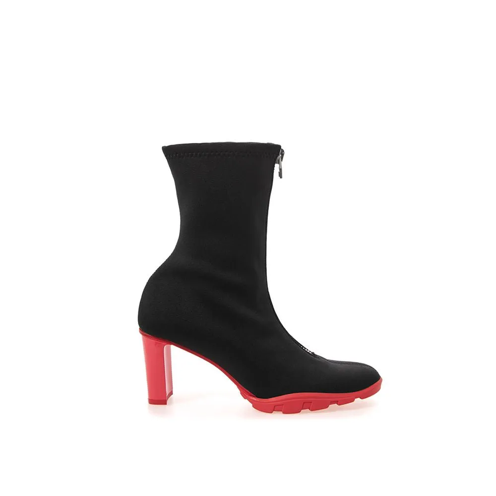 Sleek Neoprene and Leather Black Boots sold by Louxly