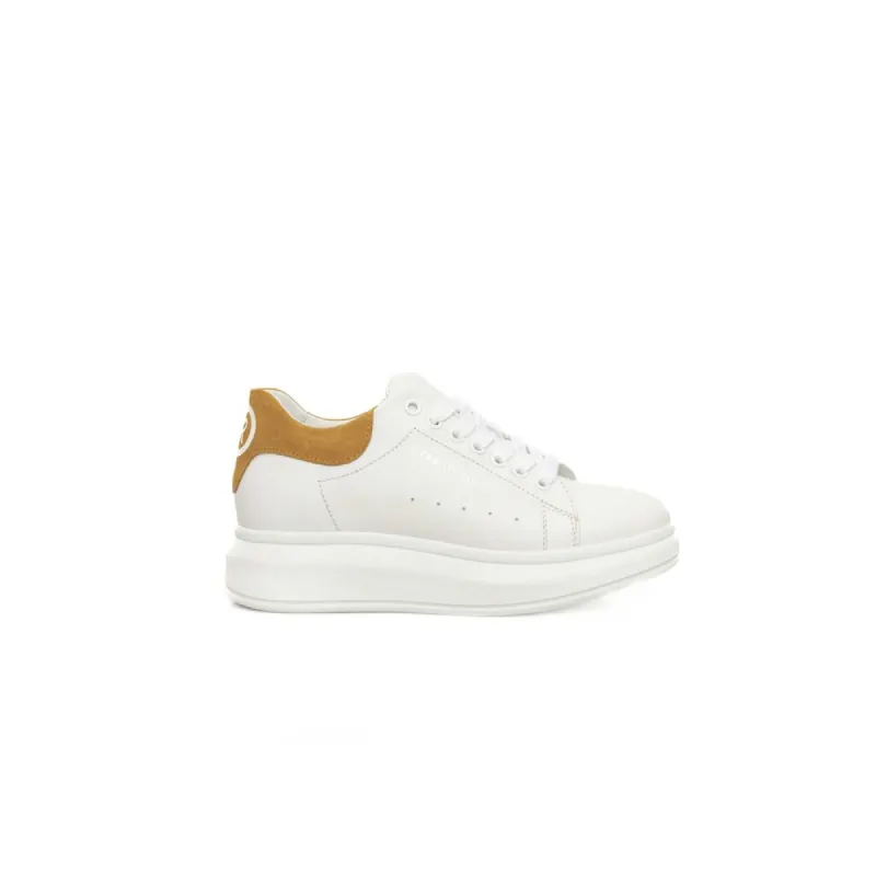 White Leather Women Sneaker sold by Louxly