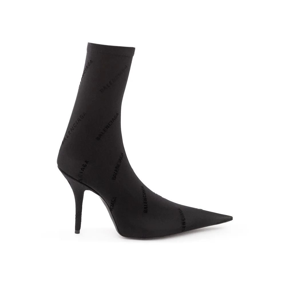 Elegant Black Spandex Statement Boots sold by Louxly