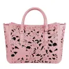 Chic Pink Calfskin Handbag with Floral Accents sold by Louxly
