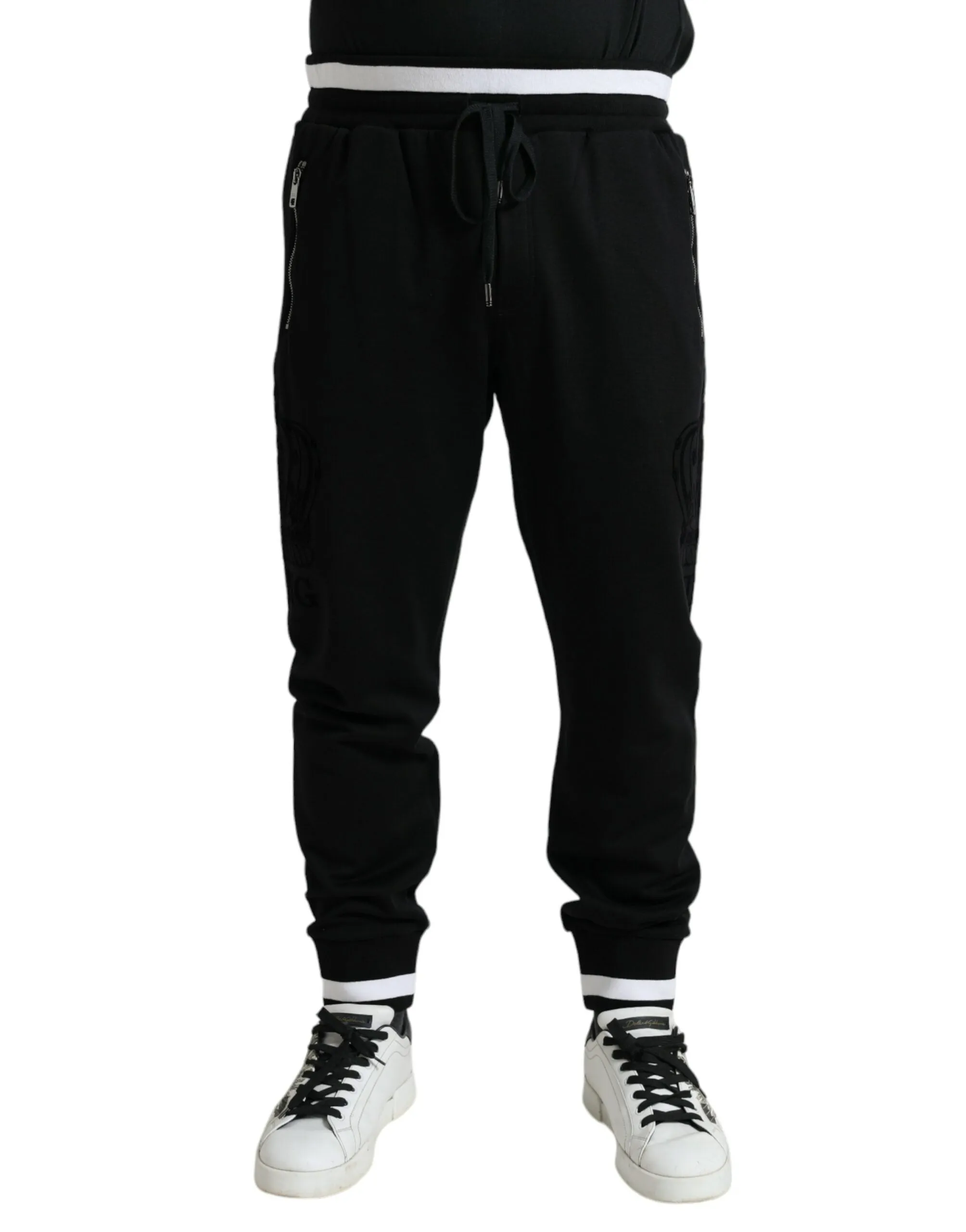 Elegant Black and White Cotton Joggers sold by Louxly