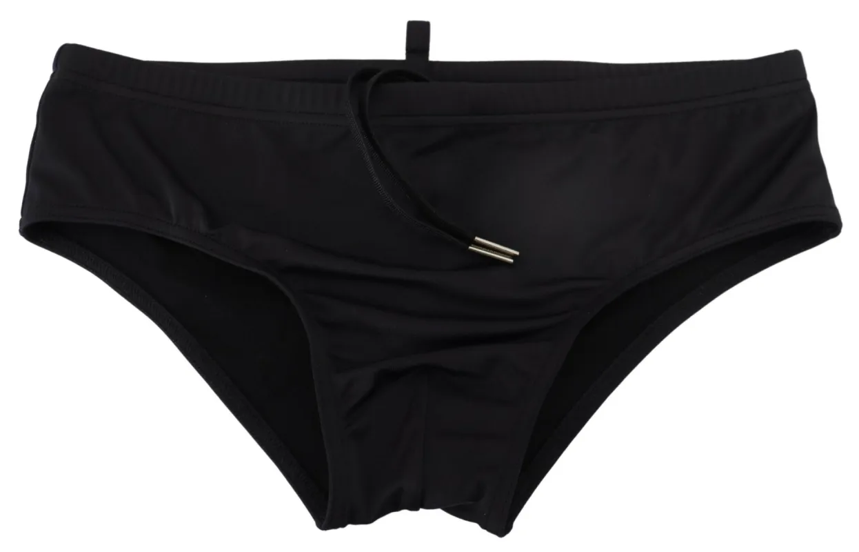 Elegant Black Swim Briefs with Orange Logo sold by Louxly