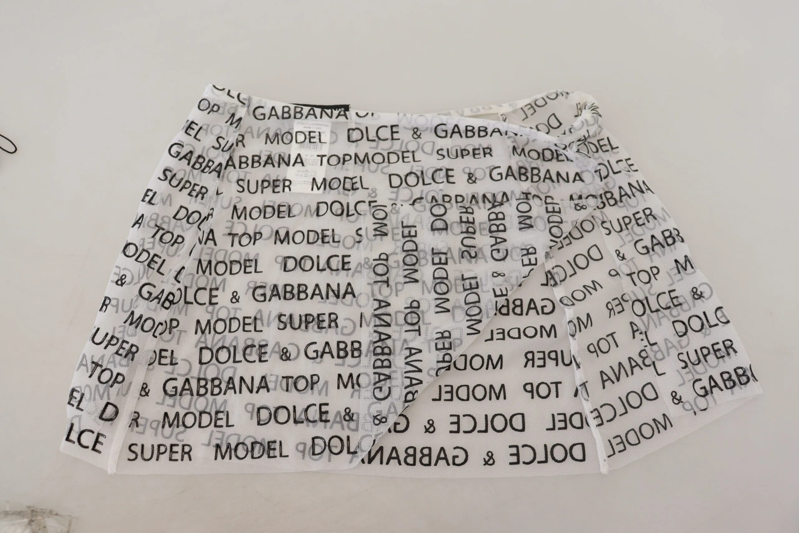 Elegant White Logo Print Mini Skirt sold by Louxly product image thumbnail 4