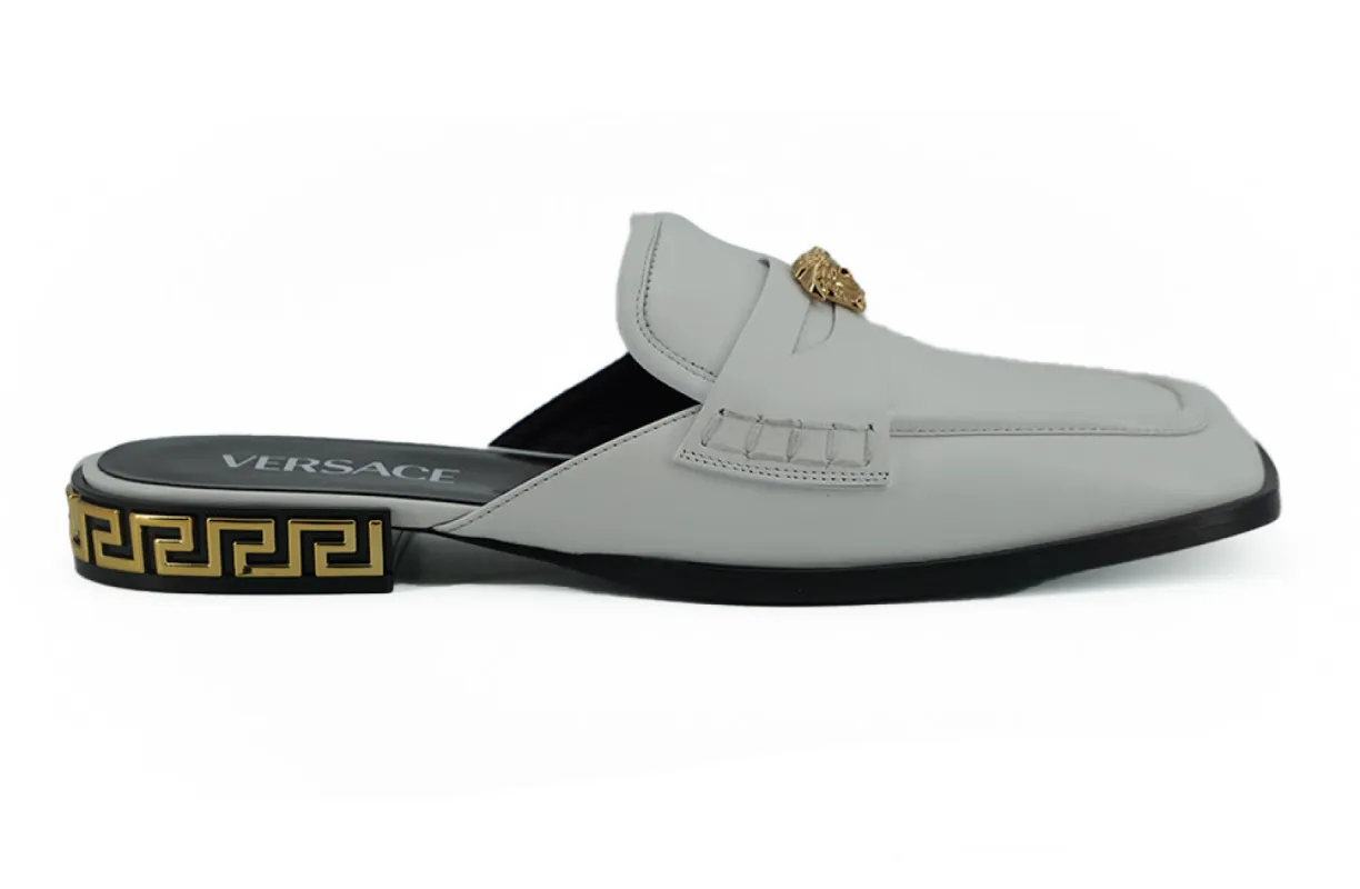 Elegant White Leather Flat Slides sold by Louxly