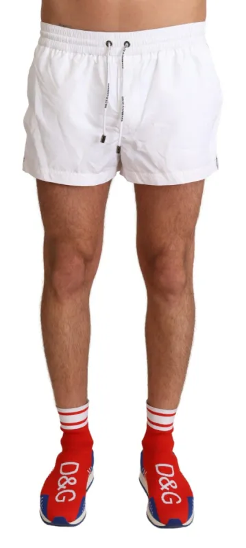 Elegant White KING Motive Swim Trunks sold by Louxly