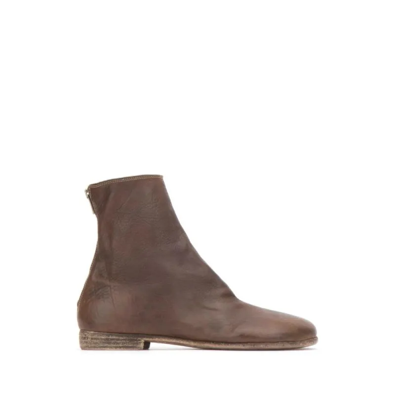 Brown  Boot sold by Louxly