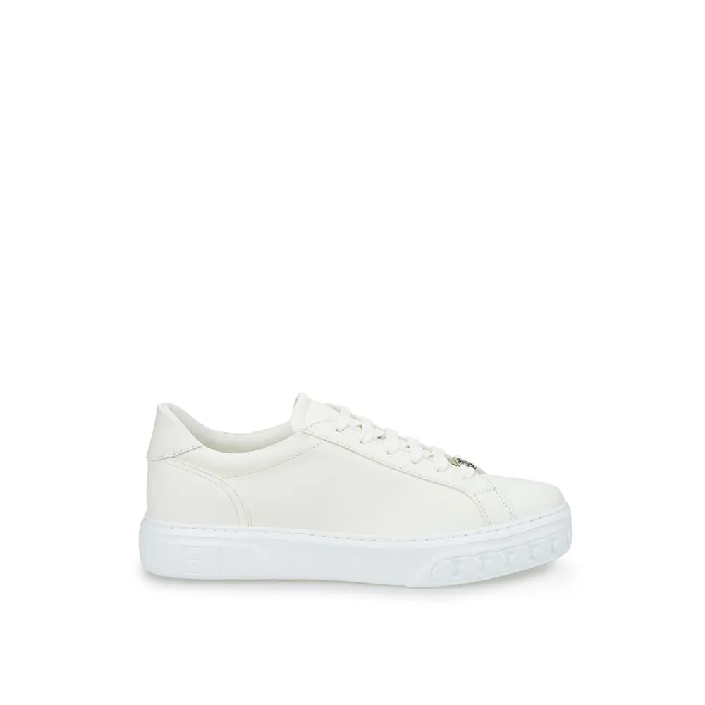 Sleek White Leather Sneakers sold by Louxly