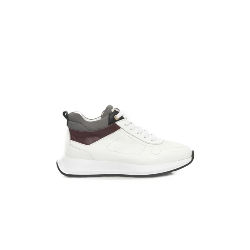White Leather Women Sneaker sold by Louxly