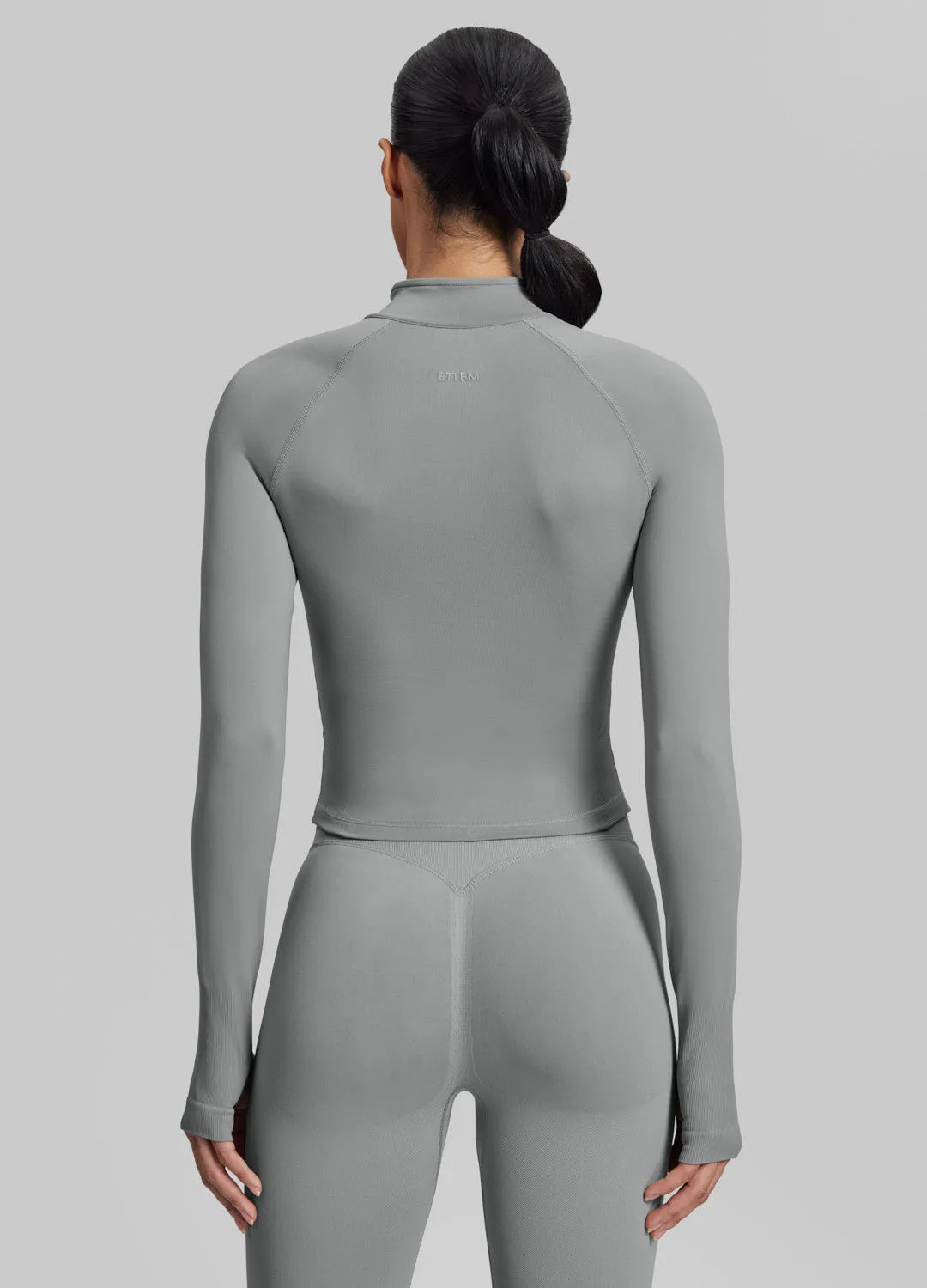Ultrasculpt Longline Form-Fitting Seamless Thumb Hole Twill Knit Half-Zip Top sold by BetterMe product image thumbnail 3