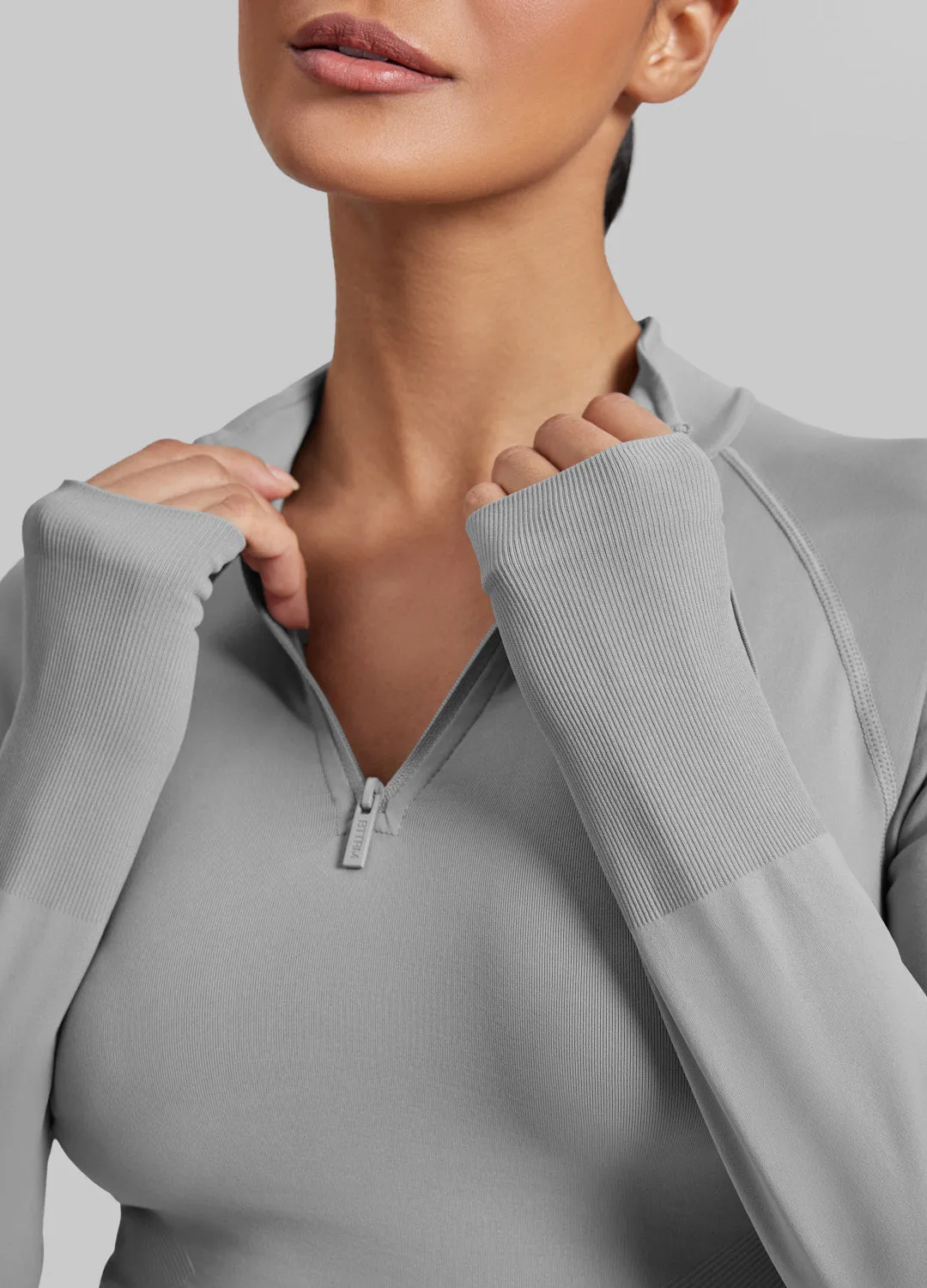Ultrasculpt Longline Form-Fitting Seamless Thumb Hole Twill Knit Half-Zip Top sold by BetterMe product image thumbnail 4