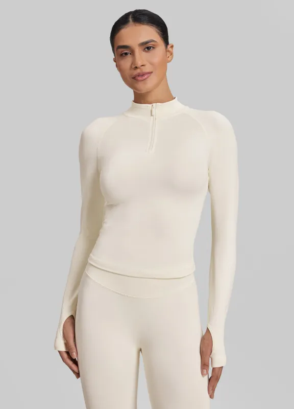 Ultrasculpt Longline Form-Fitting Seamless Thumb Hole Twill Knit Half-Zip Top sold by BetterMe