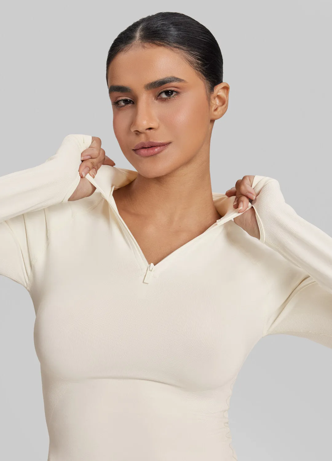 Ultrasculpt Longline Form-Fitting Seamless Thumb Hole Twill Knit Half-Zip Top sold by BetterMe product image thumbnail 4
