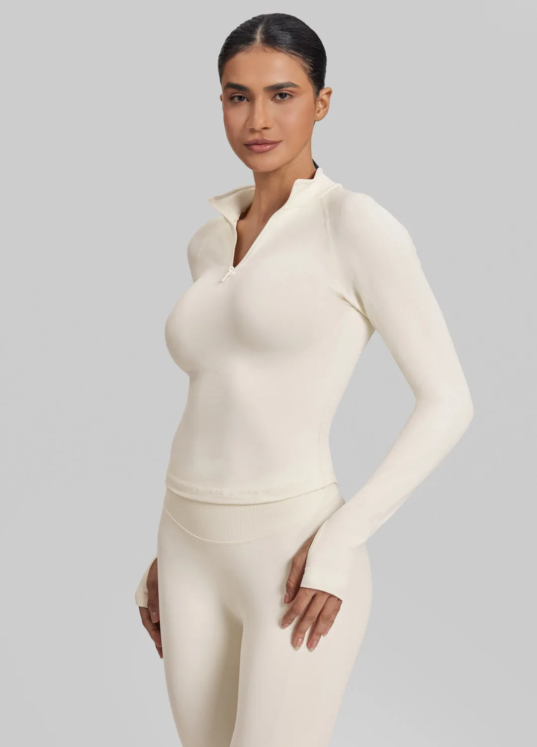 Ultrasculpt Longline Form-Fitting Seamless Thumb Hole Twill Knit Half-Zip Top sold by BetterMe product image thumbnail 2