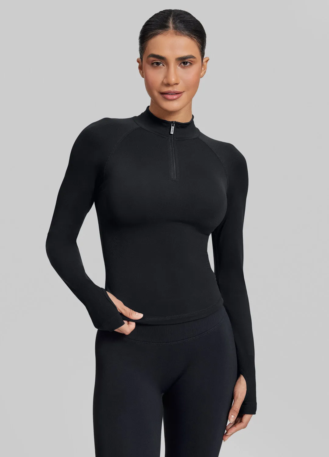 Ultrasculpt Longline Form-Fitting Seamless Thumb Hole Twill Knit Half-Zip Top sold by BetterMe