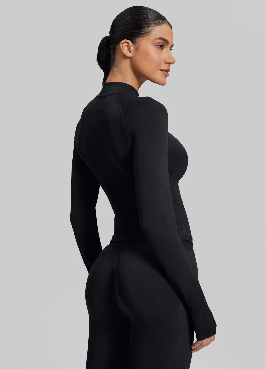 Ultrasculpt Longline Form-Fitting Seamless Thumb Hole Twill Knit Half-Zip Top sold by BetterMe product image thumbnail 2