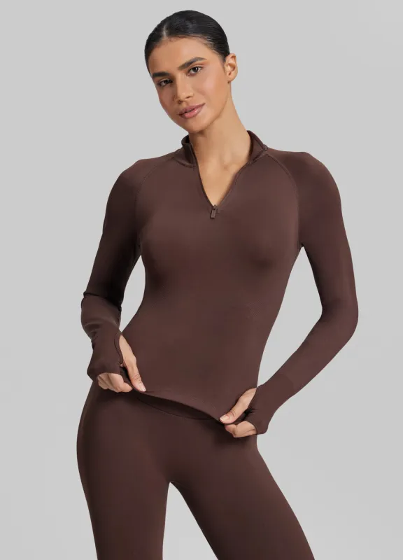 Ultrasculpt Longline Form-Fitting Seamless Thumb Hole Twill Knit Half-Zip Top sold by BetterMe