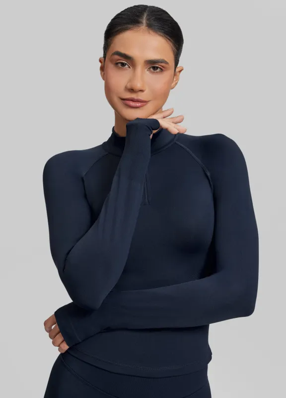 Ultrasculpt Longline Form-Fitting Seamless Thumb Hole Twill Knit Half-Zip Top sold by BetterMe