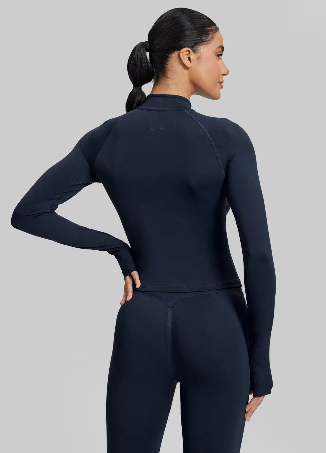 Ultrasculpt Longline Form-Fitting Seamless Thumb Hole Twill Knit Half-Zip Top sold by BetterMe product image thumbnail 3