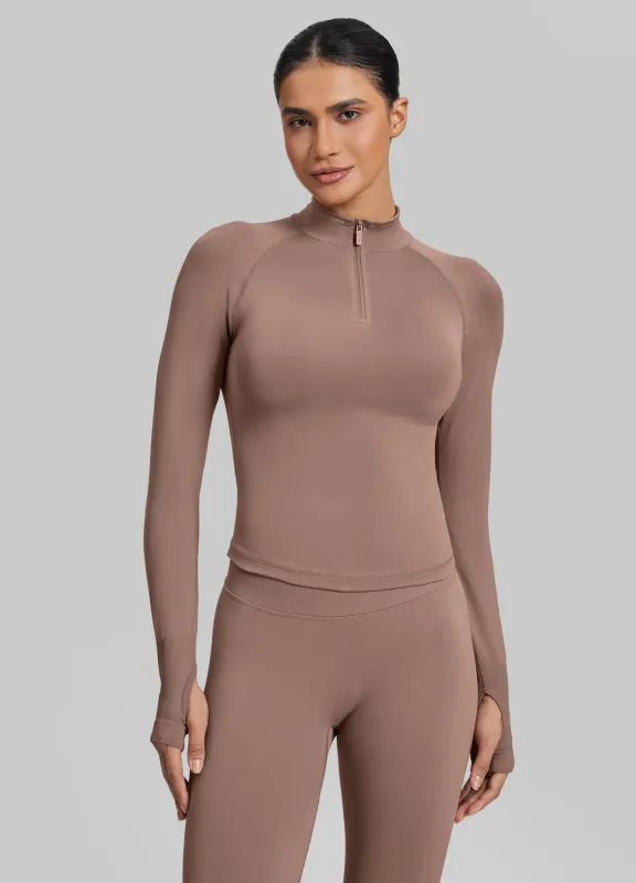 Ultrasculpt Longline Form-Fitting Seamless Thumb Hole Twill Knit Half-Zip Top sold by BetterMe