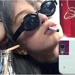 OLVERA Black Oval Sunglasses sold by Giant Vintage