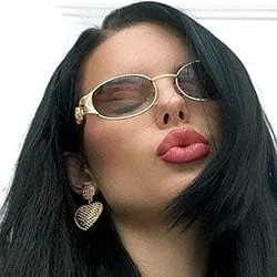 SLIPPERY Gold/Brown Oval Sunglasses sold by Giant Vintage