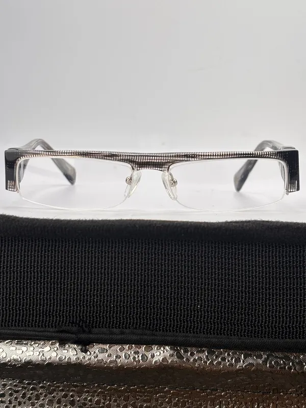 TEASE Office Siren Bayonetta Glasses sold by Giant Vintage