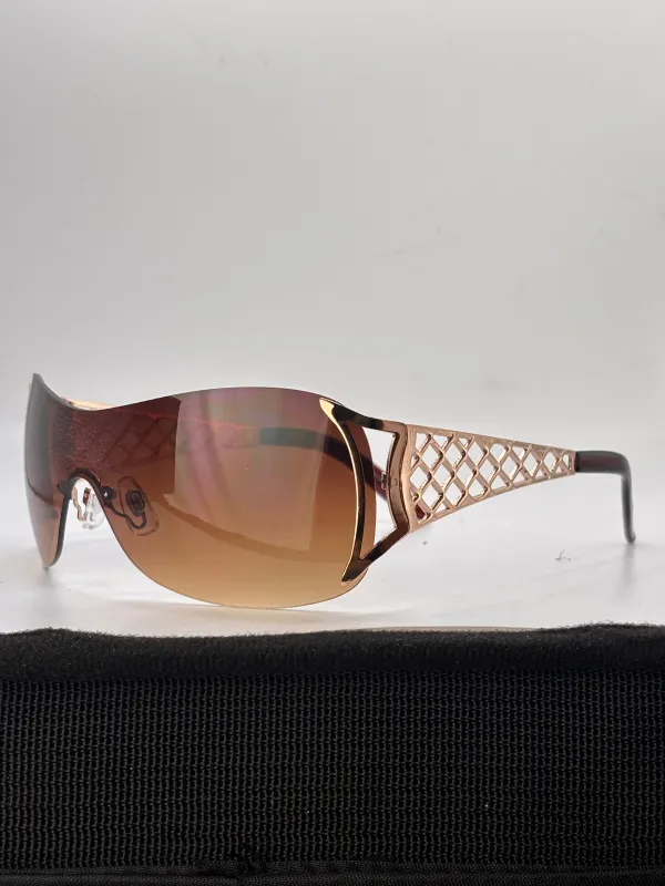 POPULAR Rimless Shield Sunglasses sold by Giant Vintage