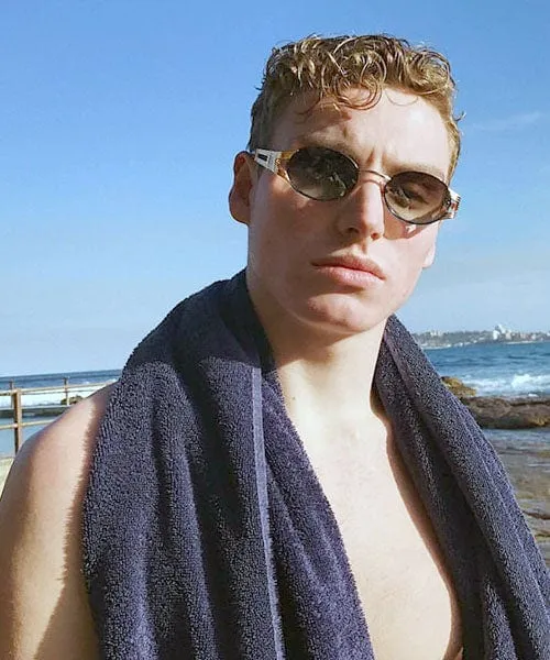 POSE Gold/Black Oval Sunglasses sold by Giant Vintage product image thumbnail 4