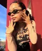 SLIM Black Oval Sunglasses sold by Giant Vintage