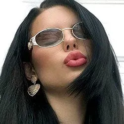 SLIPPERY Silver/Smoke Oval Sunglasses sold by Giant Vintage