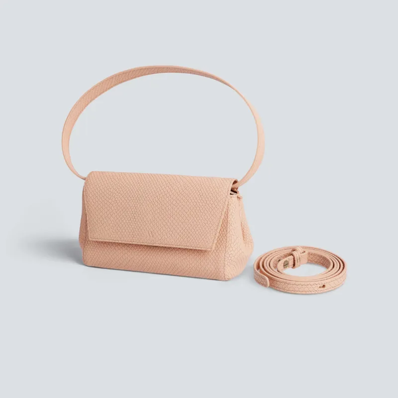 Ikon clutch - lizard peach sold by Kaai nv