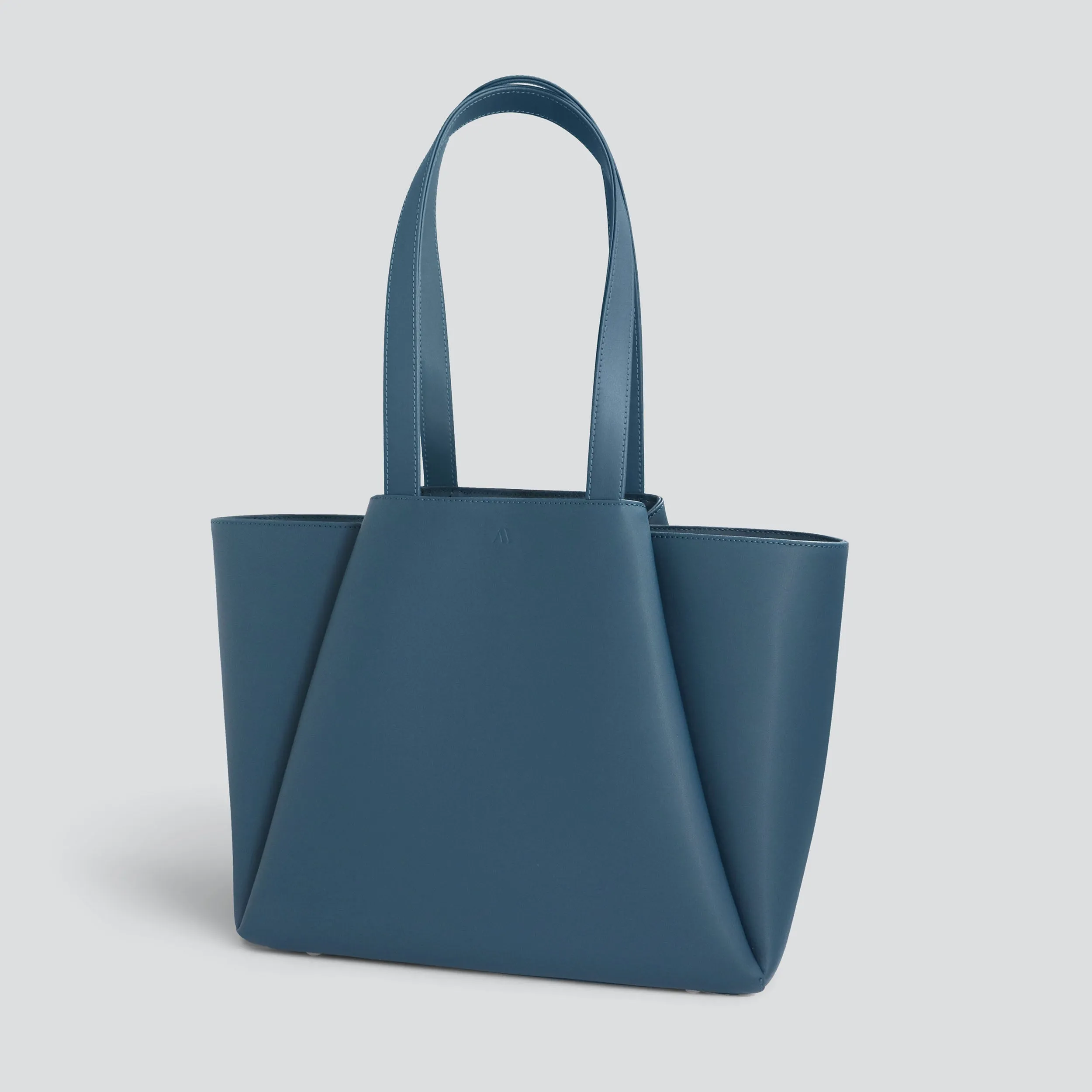 Midi Pyramid - teal blue sold by Kaai nv