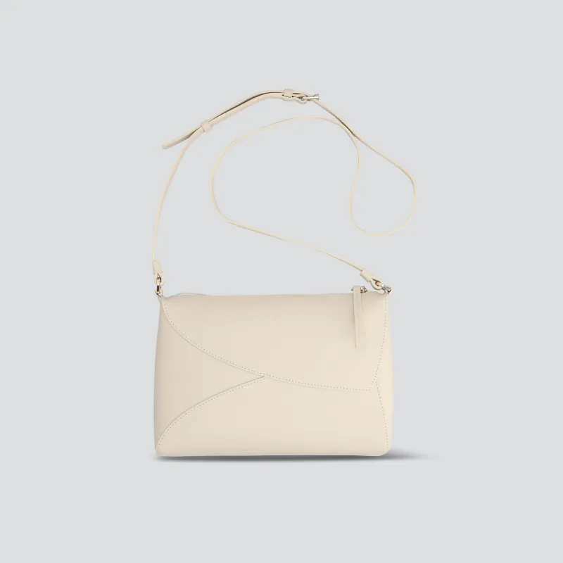Rebel Clutch - soft touch cream sold by Kaai nv
