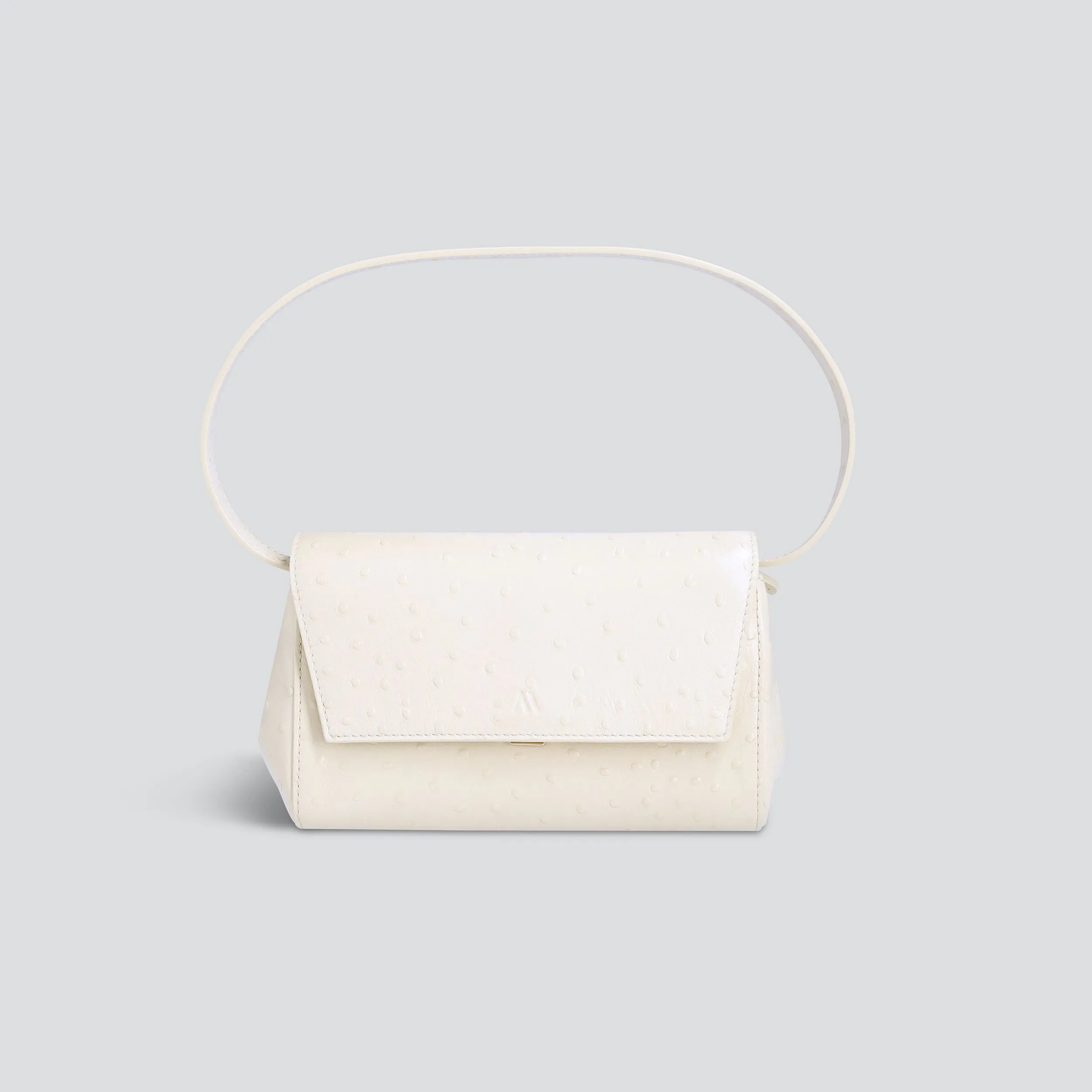 Ikon Clutch - ostrich cream sold by Kaai nv