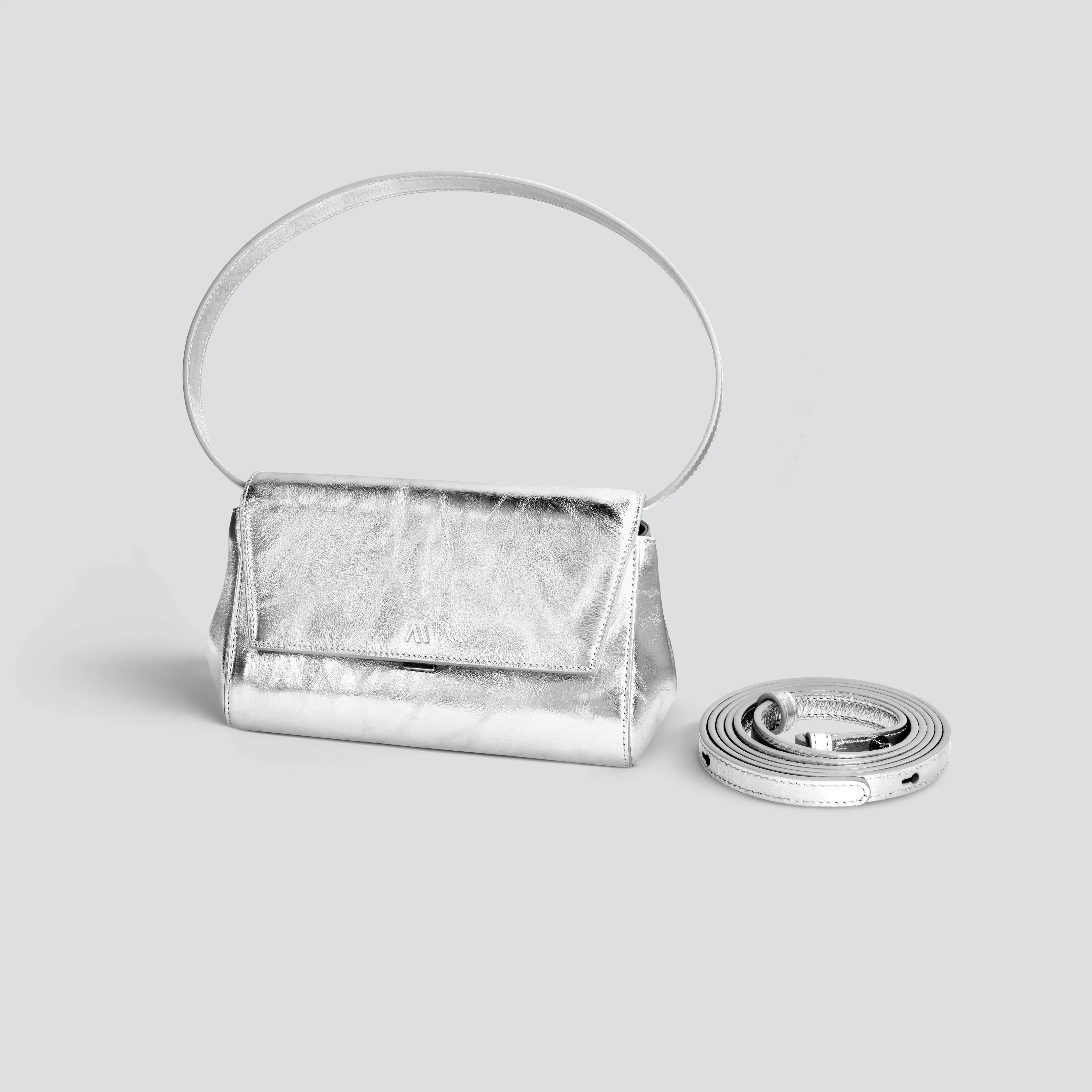 Ikon clutch - silver sold by Kaai nv