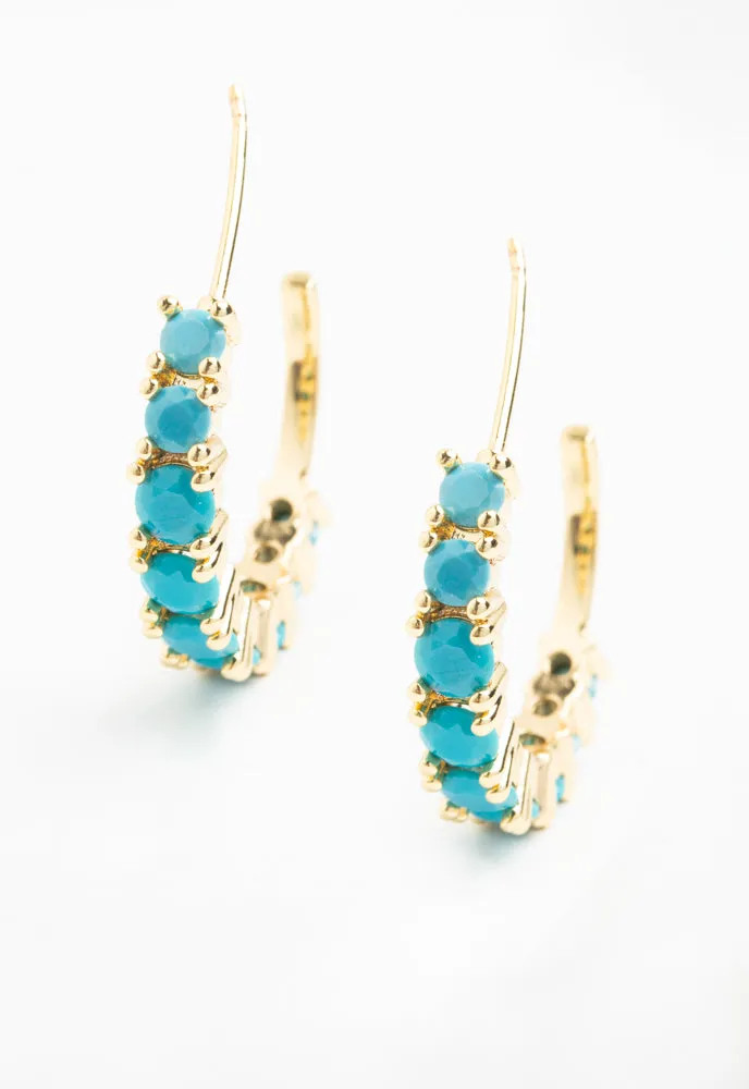 Shine Hoops in Aquamarine Zircon sold by Starfish Project