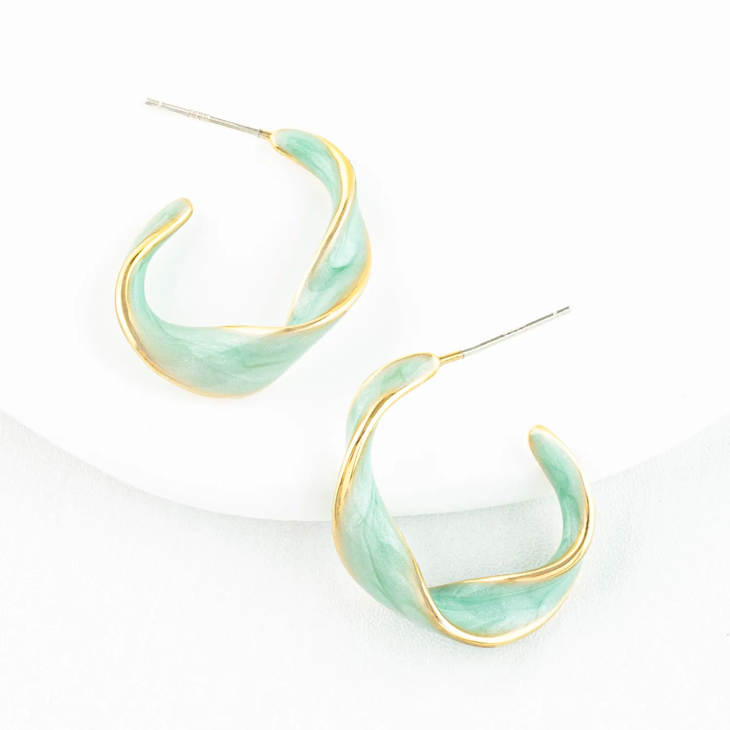 With a Twist Hoops in Mint sold by Starfish Project