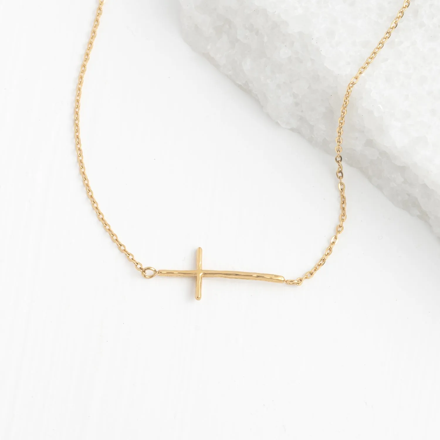 Radiant Cross Necklace in Gold sold by Starfish Project