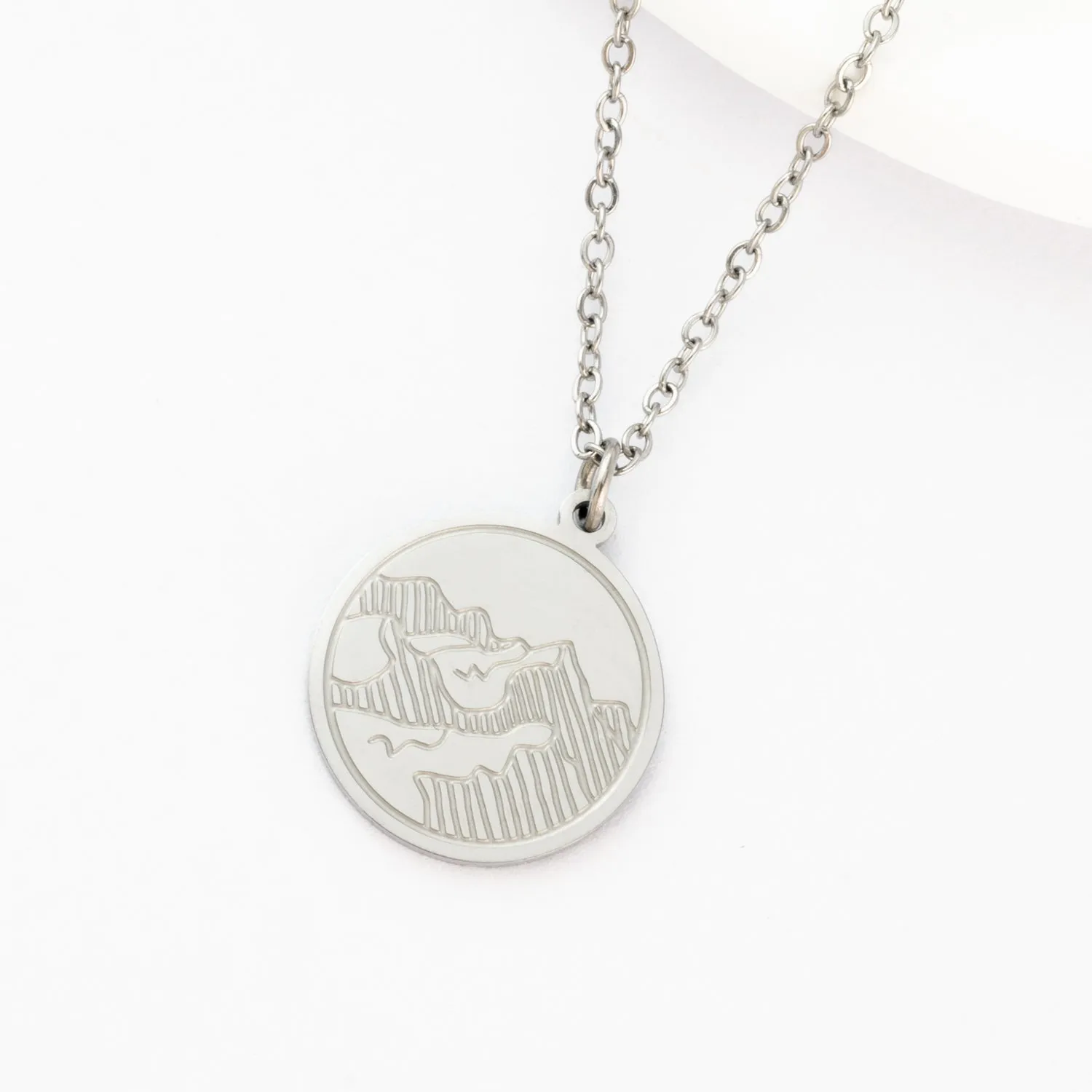 Mountain Adventure Necklace in Silver sold by Starfish Project