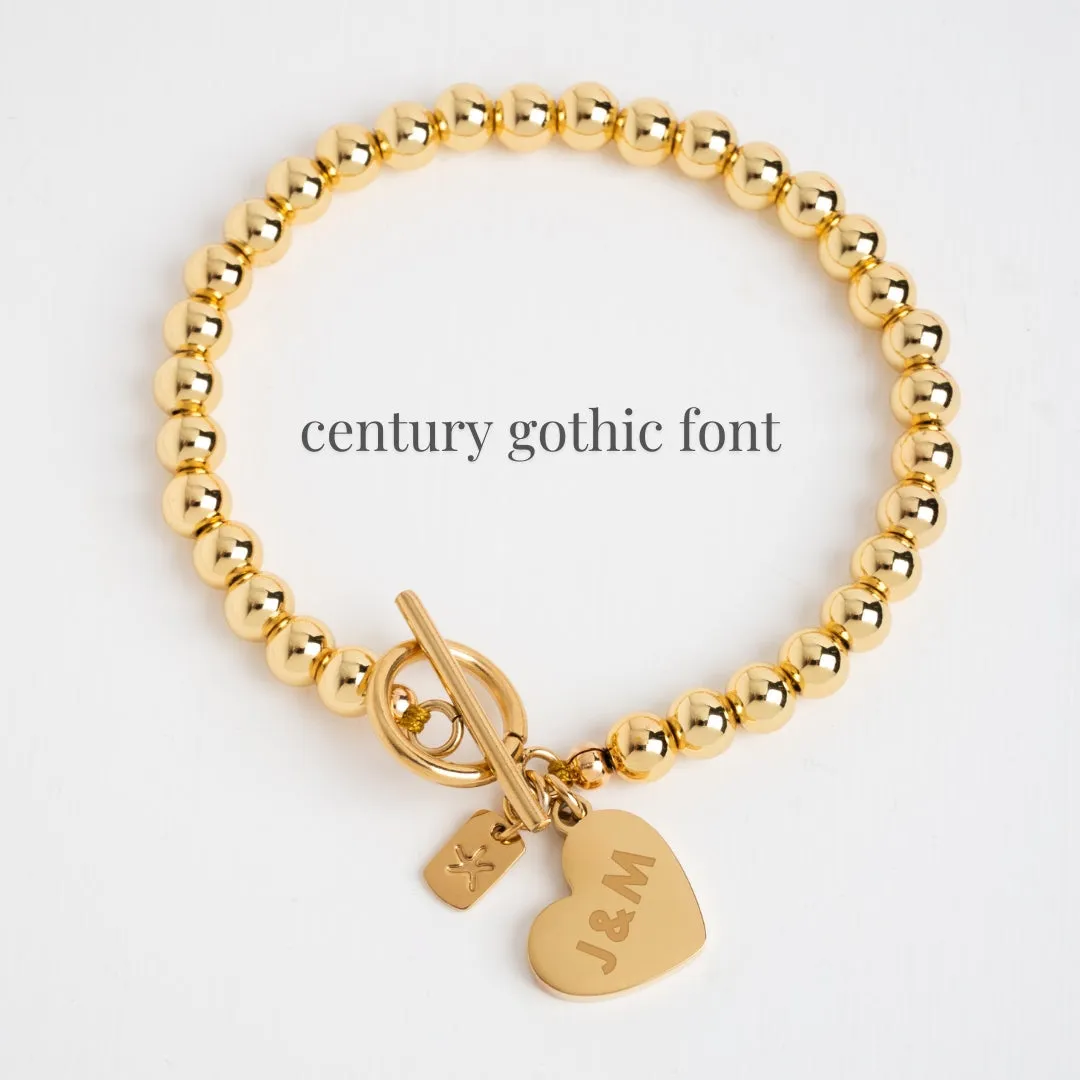 Engravable Heart Pendant on Handbeaded Gold Bracelet sold by Starfish Project product image thumbnail 2