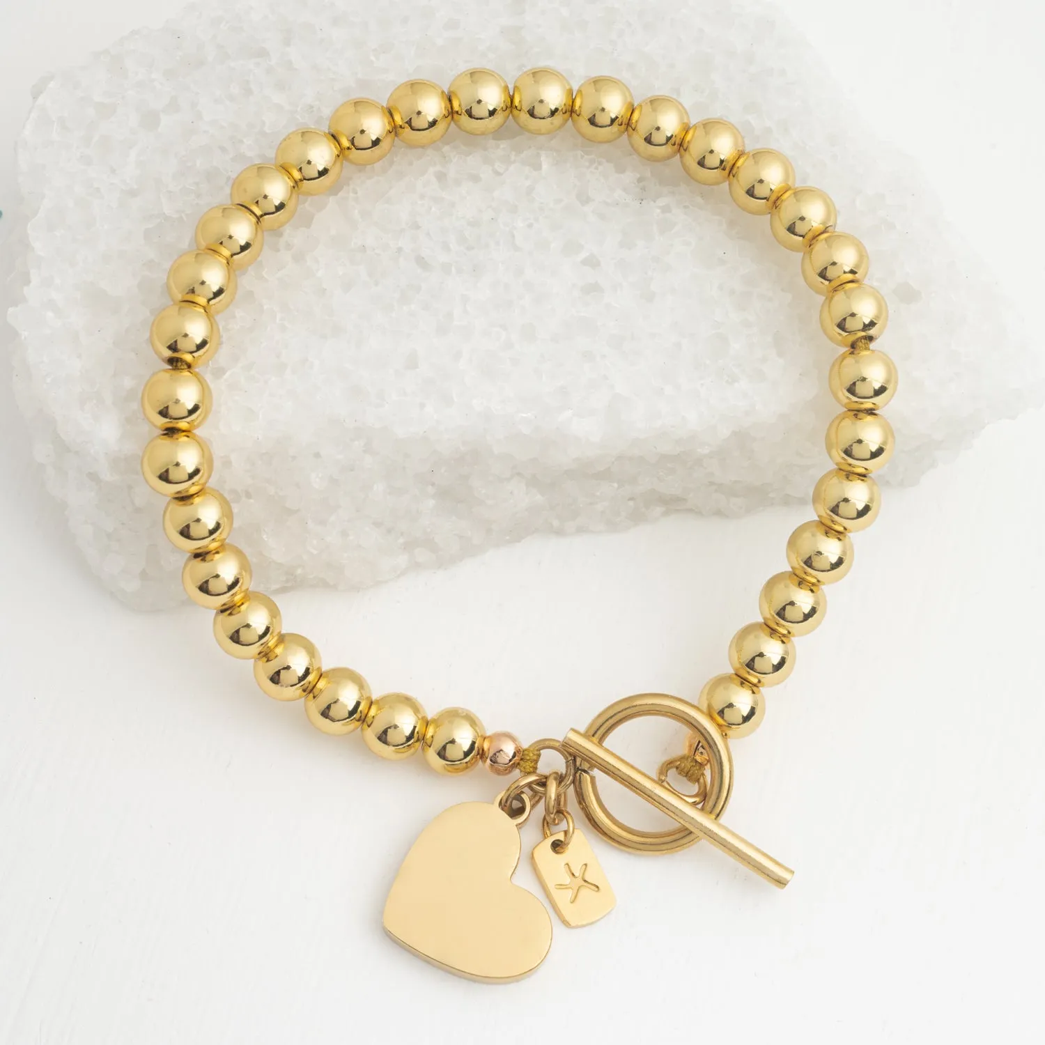 Engravable Heart Pendant on Handbeaded Gold Bracelet sold by Starfish Project product image thumbnail 5