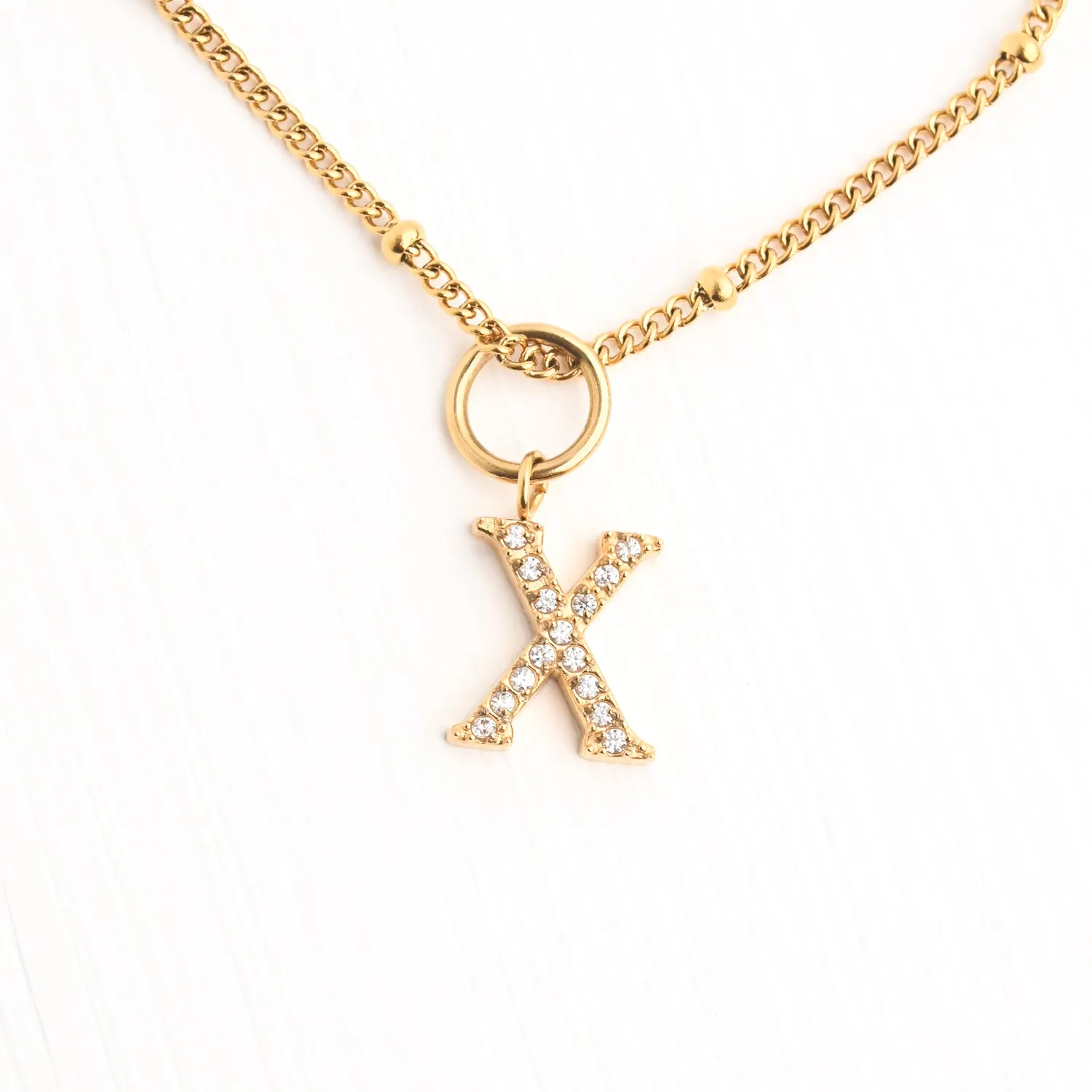 X Initial Long Necklace sold by Starfish Project