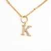 K Initial Long Necklace sold by Starfish Project